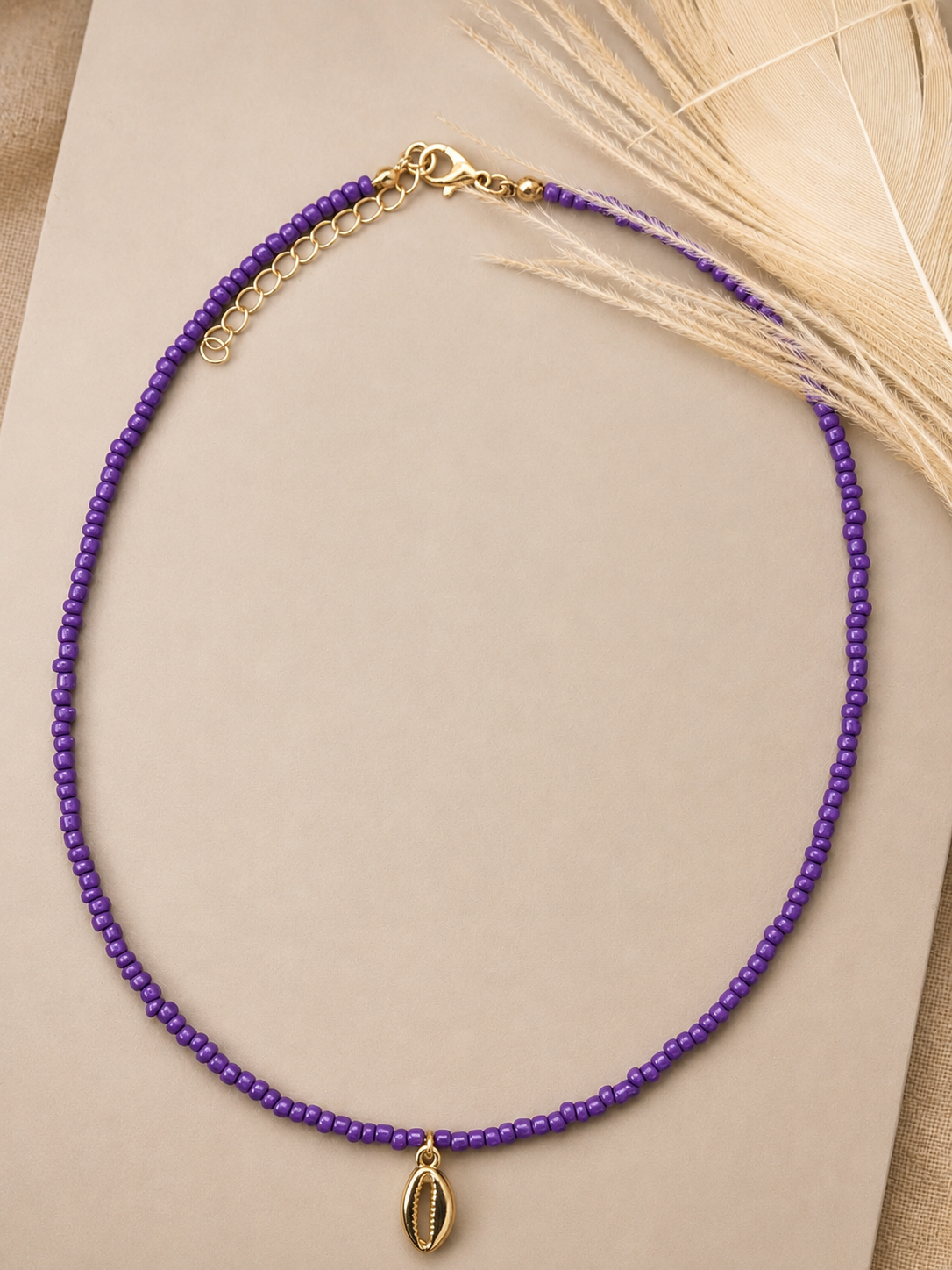 Paarse kralenketting met gouden schelphanger 💜
