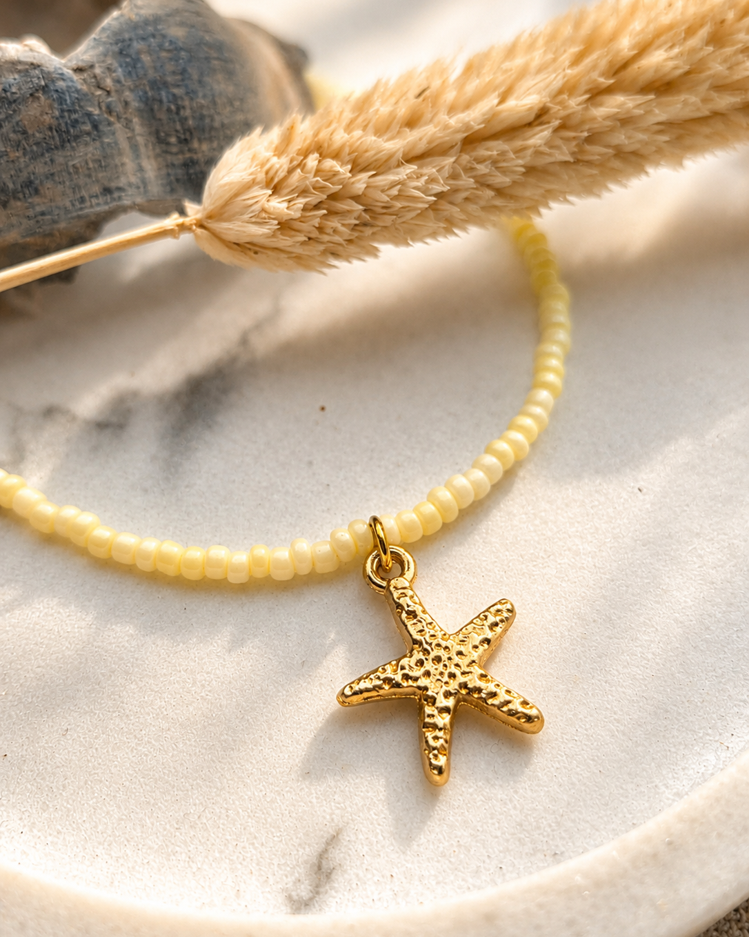 Botergele kralenketting met zeesterretje 💛