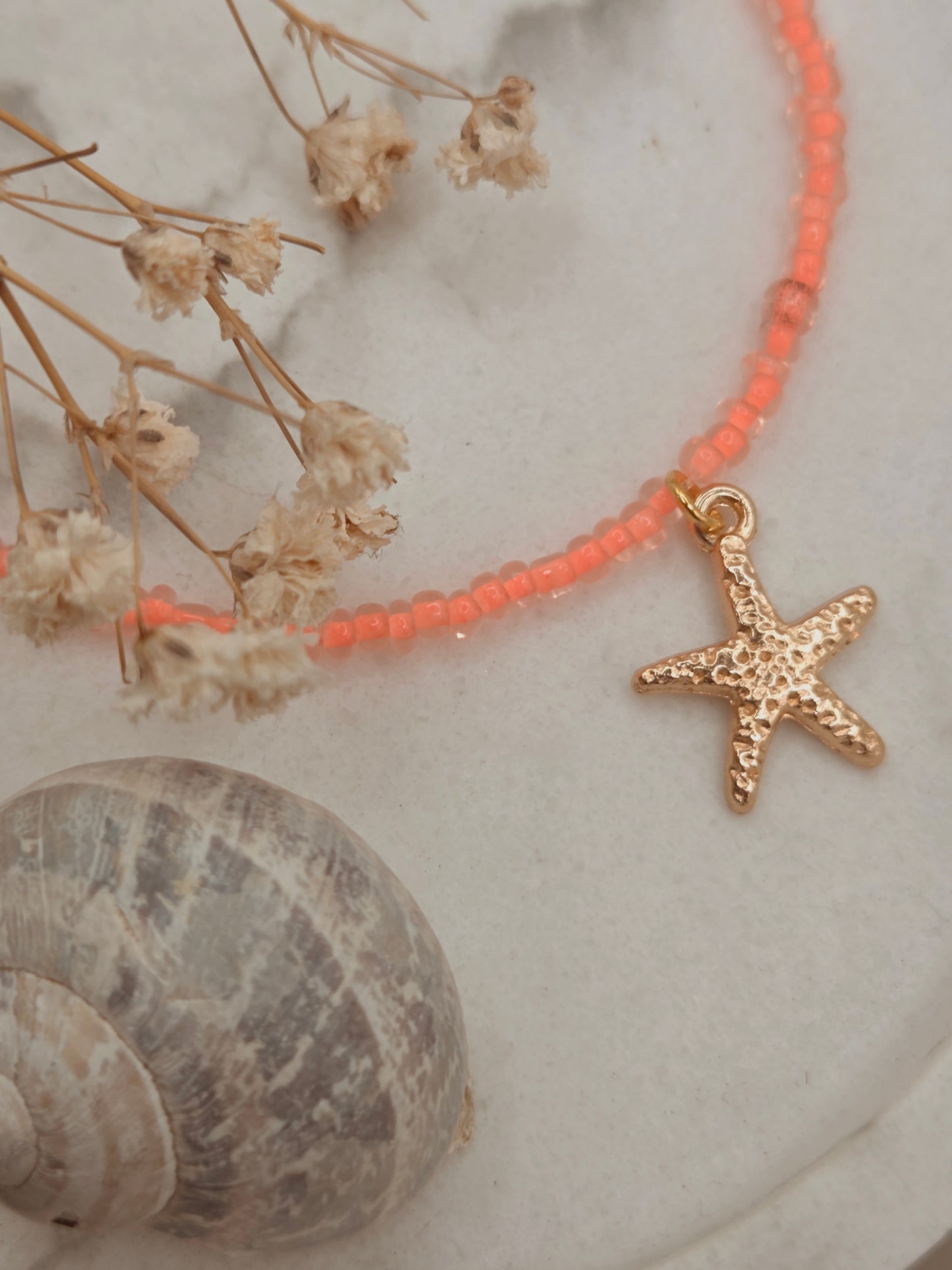 Neon koraalroze kralenketting met zeester 🪸
