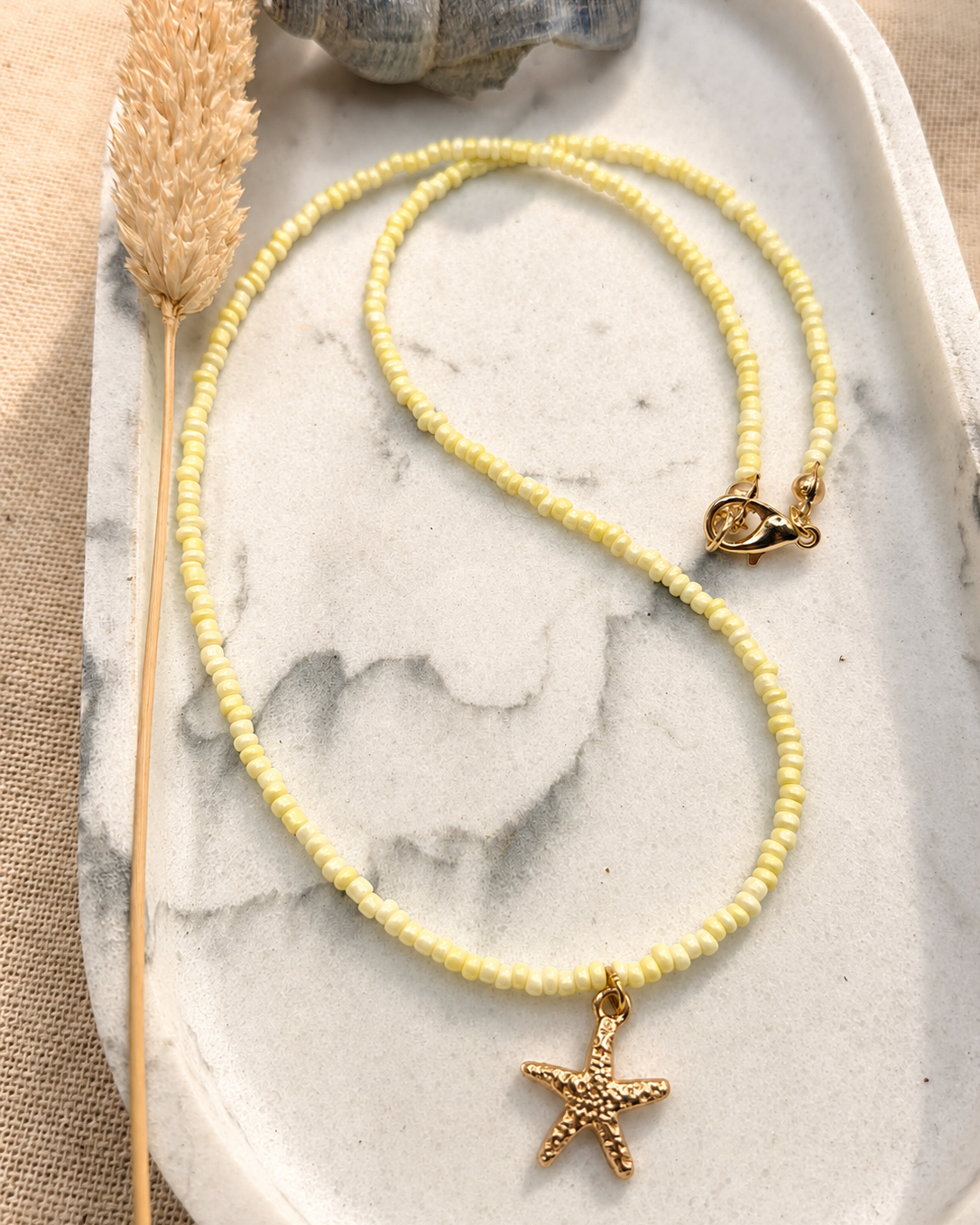 Botergele kralenketting met zeesterretje 💛