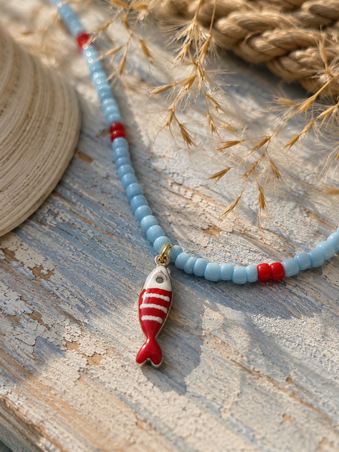 Marina beachketting met Visje